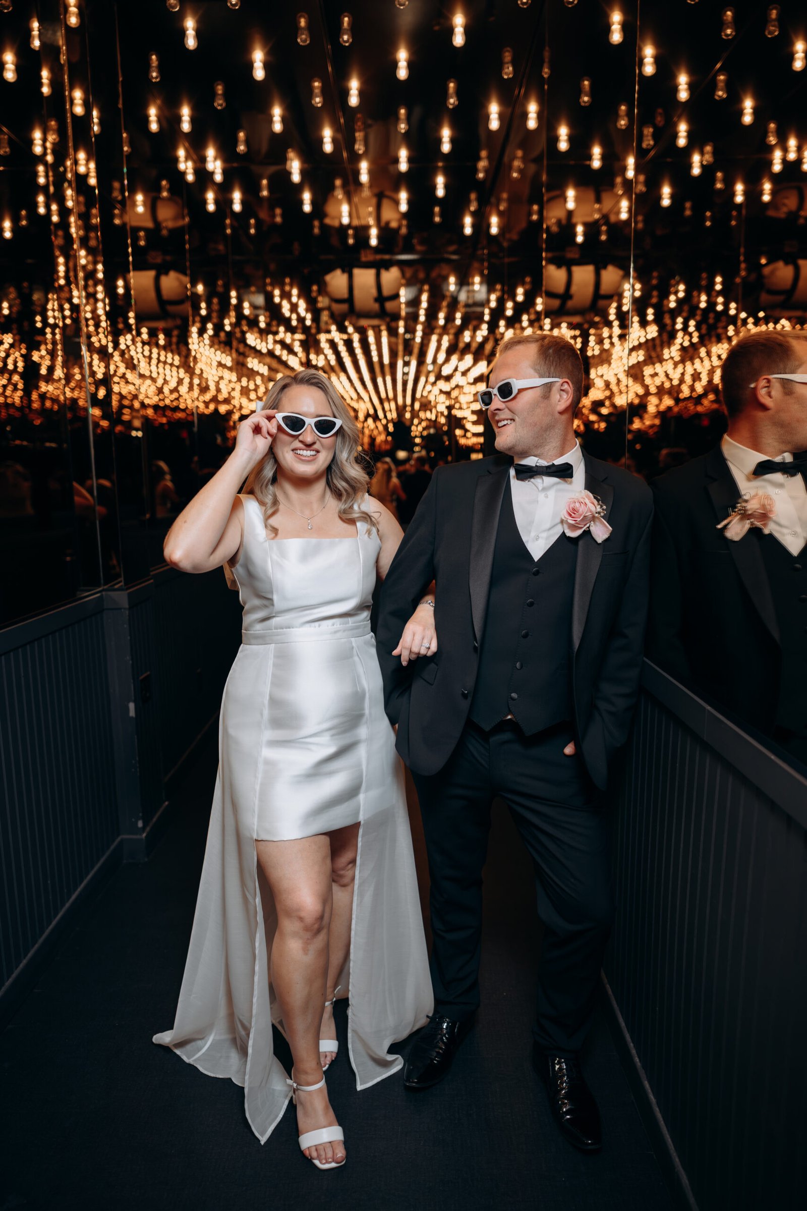 Couple enjoying the Fremont Street lights during their Vegas elopement