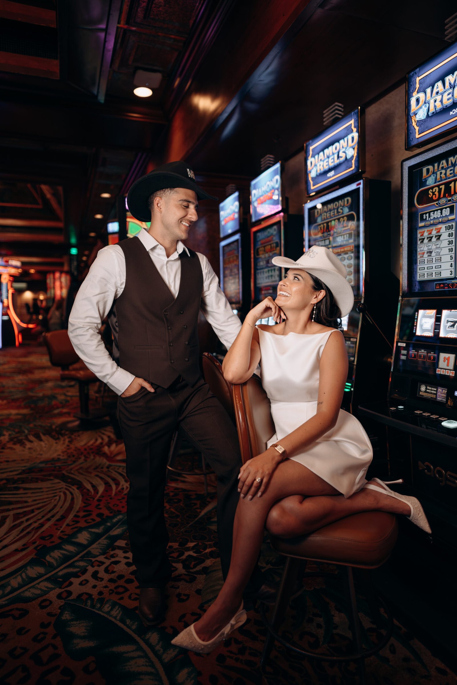 Couple celebrating their Las Vegas elopement inside a casino on Fremont Street